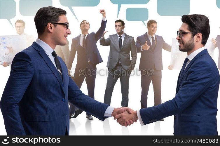 The cooperationa and teamwork concept with handshake. Cooperationa and teamwork concept with handshake