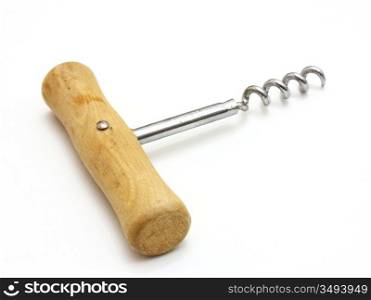 The corkscrew with the wooden handle lies on a white background