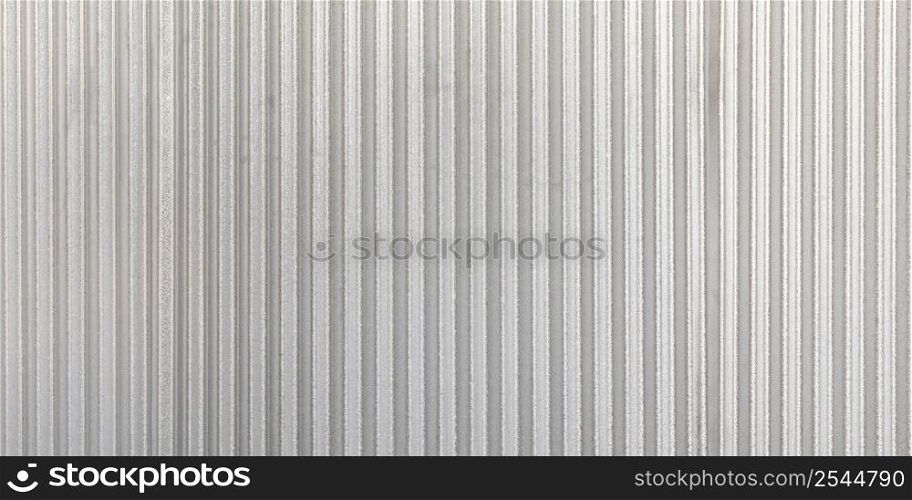 The corrugated grey metal panorama wall background. Rusty zinc grunge texture and background.