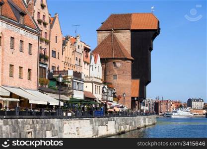 The Crane (Polish: Zuraw) and historic architecture of the Old Town waterfront in Gdansk, Poland
