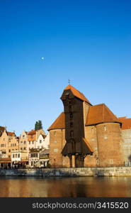 The Crane (Polish: Zuraw), famous landmark in the Old Town of Gdansk (Danzig) at the Motlawa river in Poland, composition with copyspace