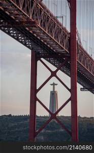 the Cristo Rei Statue and the Ponte 25 de Abril or 25the April Bridge at the Rio Tejo near the City of Lisbon in Portugal. Portugal, Lisbon, October, 2021