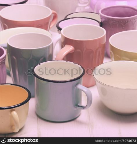 The cups in shabby chic style, vintage colors