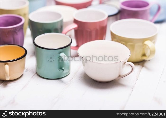 The cups in shabby chic style, vintage colors