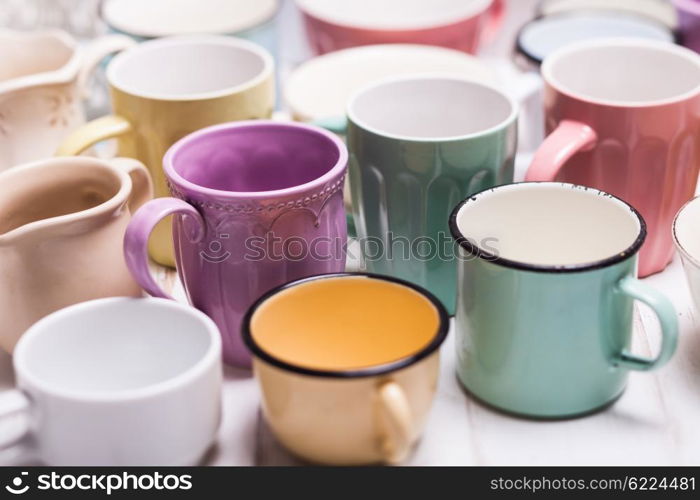 The cups in shabby chic style, vintage colors