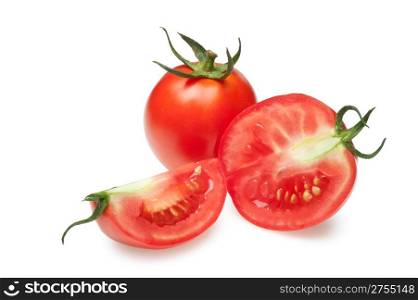 The cut tomatoes. It is isolated on a white background