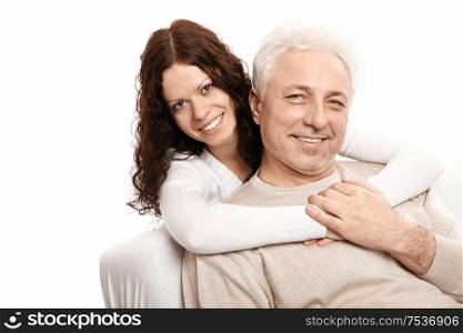 The daughter embraces the father on a white background