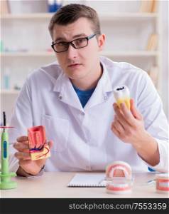 The dentist working teeth implant in medical lab. Dentist working teeth implant in medical lab