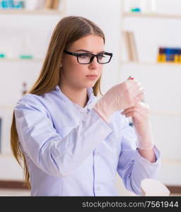 The dentistry student practicing skills in classroom. Dentistry student practicing skills in classroom