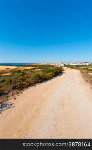 The Dirt Road Leading to the City on the Atlantic Coast of Portugal