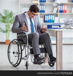 The disabled businessman working in the office. Disabled businessman working in the office