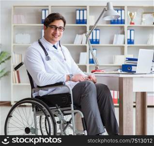 The disabled doctor on wheelchair working in hospital. Disabled doctor on wheelchair working in hospital