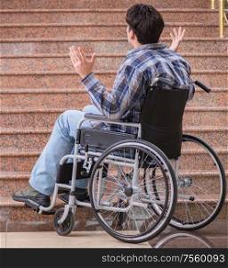 The disabled man on wheelchair having trouble with stairs. Disabled man on wheelchair having trouble with stairs