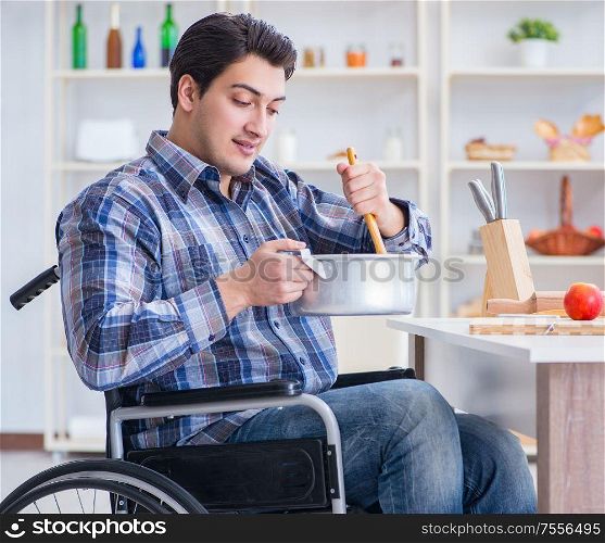 The disabled man preparing soup at kitchen. Disabled man preparing soup at kitchen