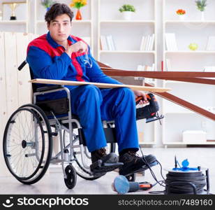 The disabled man working with circular saw. Disabled man working with circular saw