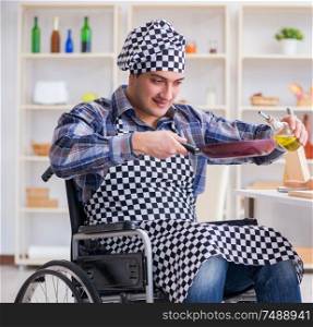 The disabled young husband frying at kitchen. Disabled young husband frying at kitchen