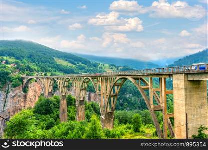 The Djurdjevic Bridge on river Tara in mountains of Montenegro. The Djurdjevic Bridge on river Tara