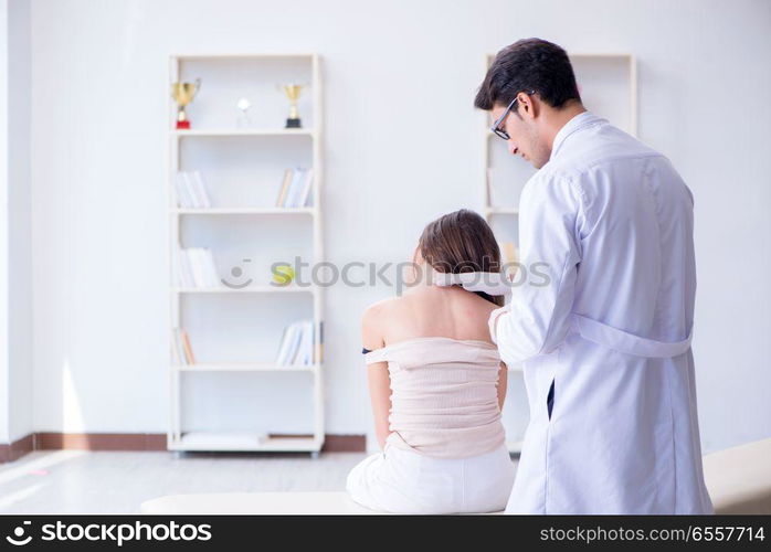 The doctor examining the skin of female patient. Doctor examining the skin of female patient