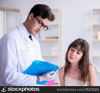 The doctor examining the skin of female patient. Doctor examining the skin of female patient