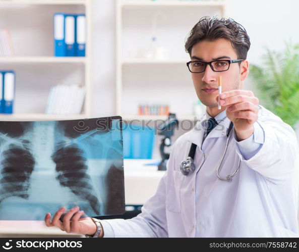 The doctor examining x-ray images of patient. Doctor examining x-ray images of patient