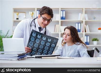 The doctor explaining to patient results of x-ray imaging. Doctor explaining to patient results of x-ray imaging. The doctor explaining to patient results of x-ray imaging