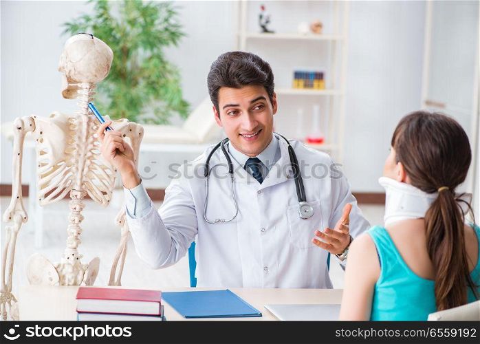 The doctor is explaining to patient with neck injury. Doctor is explaining to patient with neck injury