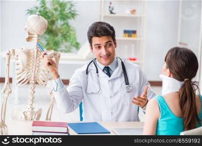 The doctor is explaining to patient with neck injury. Doctor is explaining to patient with neck injury