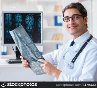 The doctor radiologist looking at x-ray images. Doctor radiologist looking at x-ray images