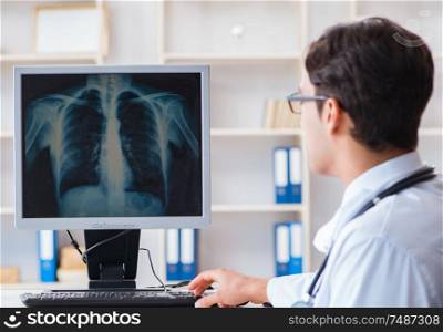 The doctor radiologist looking at x-ray images. Doctor radiologist looking at x-ray images
