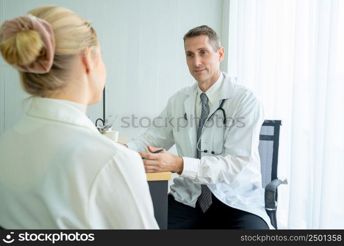 The doctor talked to the patient and tablet in office at hospital,Coronavirus Disease 2019 (COVID-19).