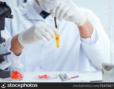 The doctor testing patients urine for medical purposes. Doctor testing patients urine for medical purposes