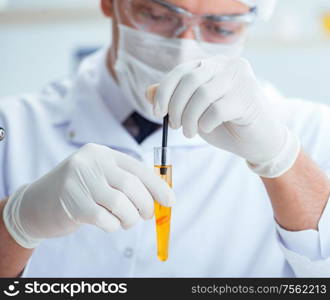 The doctor testing patients urine for medical purposes. Doctor testing patients urine for medical purposes