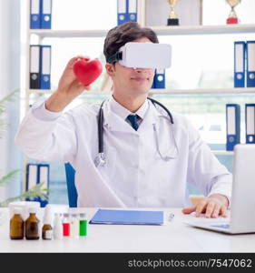 The doctor working with virtual vr reality glasses. Doctor working with virtual VR reality glasses