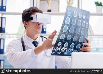 The doctor working with virtual vr reality glasses. Doctor working with virtual VR reality glasses