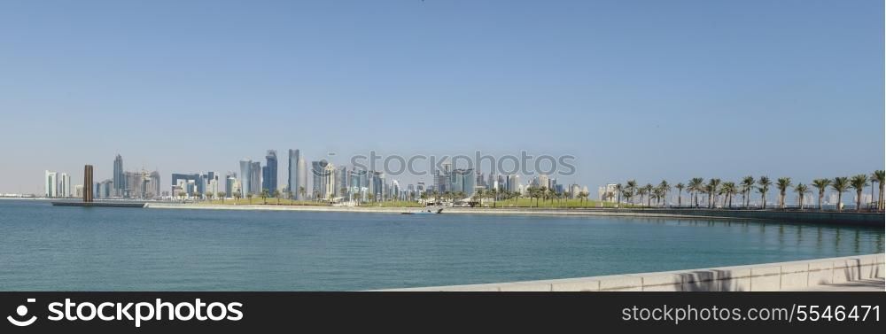 The Doha, Qatar, 21st Century skyline viewed from Museum Park, near the heart of the original city, in November 2013. The post-modern buildings have almost all been built since 2003 as part of a huge, LNG-fuelled economic boom