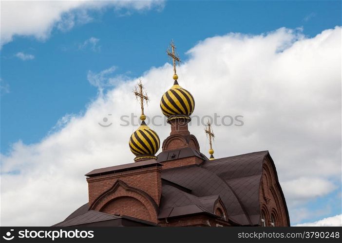 The dome of the Orthodox Church on the border between Europe and Asia, the city of Orenburg, Russia