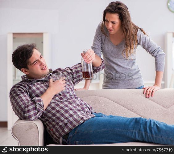 The drinking problem drunk husband man in a young family concept. Drinking problem drunk husband man in a young family concept