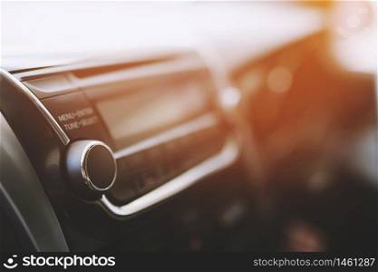 The driver listening to music in the car radio