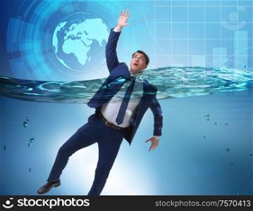 The drowning businessman in insolvency and bankruptcy concept. Drowning businessman in insolvency and bankruptcy concept