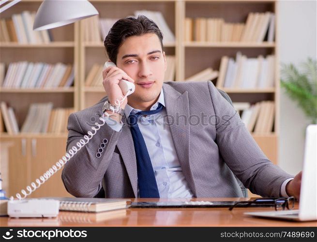 The drug addict businessman in the office. Drug addict businessman in the office