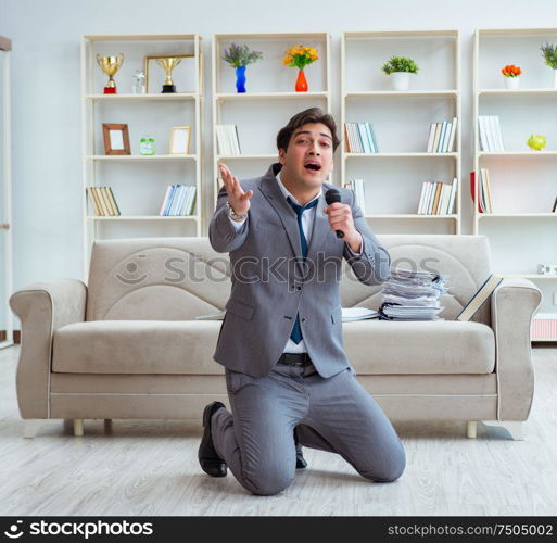 The drunk businessman celebrating in the office. Drunk businessman celebrating in the office