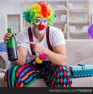 The drunk clown celebrating having a party at home. Drunk clown celebrating having a party at home