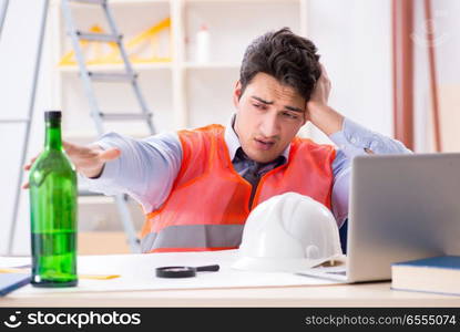 The drunk engineer working in the workshop. Drunk engineer working in the workshop