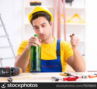 The drunk engineer working in the workshop. Drunk engineer working in the workshop