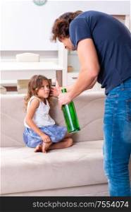 The drunk father in domestic child abuse and violence concept. Drunk father in domestic child abuse and violence concept