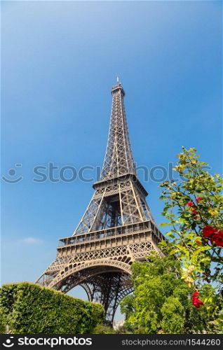 The Eiffel Tower in Paris, France in a beautiful summer day