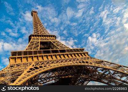 The Eiffel Tower in Paris, France in a beautiful summer day