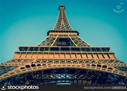 The Eiffel Tower, located on the Champ de Mars in Paris, France, with vintage style