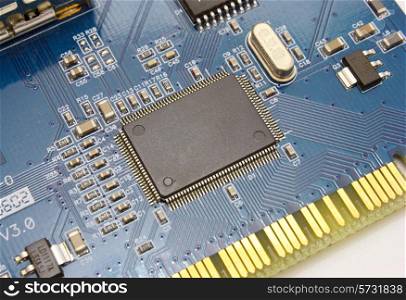The electronic scheme of the motherboard on a yellow background from radio details