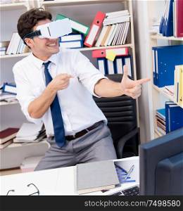 The employee watching movie on vr virtual reality glasses. Employee watching movie on vr virtual reality glasses